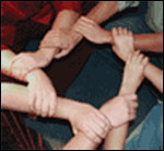 Photo of hands joined together