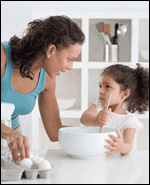 photo of mother and daughter baking