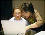 photo of woman tutoring student